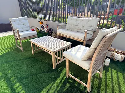 Outdoor wooden garden seating set with cushions - 4 pieces