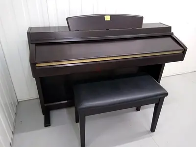 Yamaha CLP 240 Used Piano Have Small Scratches