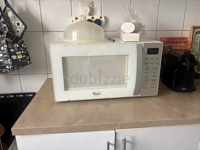 White Whirlpool Microwave in Good Working Condition