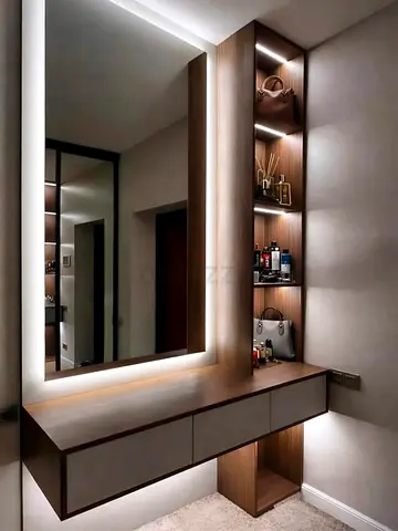 Wall-mounted vanity table with illuminated mirror and open shelving