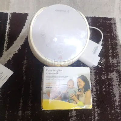 Medela Electric Breast Pump with Charger spare parts kit new- Used