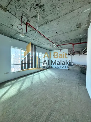 Spacious Office for Annual Rent in Al Majaz with 2,754 Sq. Ft. Area, Open View, 2 Bathrooms, Free Air Conditioning, Free Parking and Complete Flooring