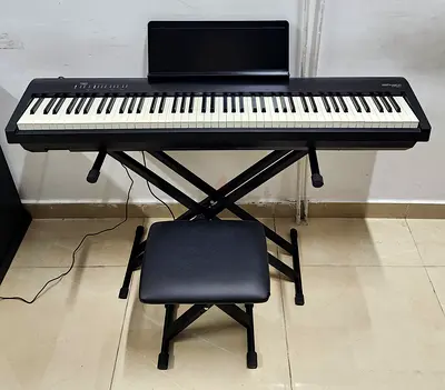 The Roland FP-30X BK is an 88-key portable digital piano in black featuring Roland's SuperNATURAL