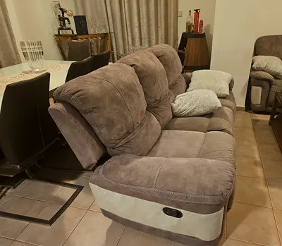 3 and 2 -seater reclining fabric sofa in grey-beige.