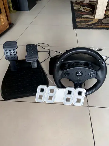 ThrustMaster T80 Racing Wheel with pedals and an extra digital clock