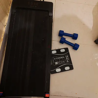 Threadmill, dumbells and weighing scale