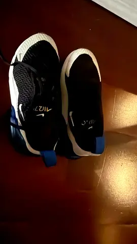 Black and white Nike running shoes, used, size 11.5 specified