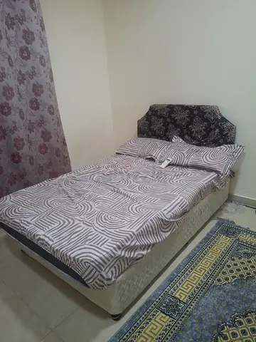 Queen size bed with mattress and headboard - good condition