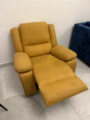 Comfortable mustard yellow reclining armchair / single recliner