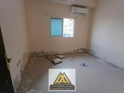 1BR in Al Hamidiya 1, Ajman, split AC, free maintenance, AED 28,008 yearly, 6 payments, easy Dubai access.