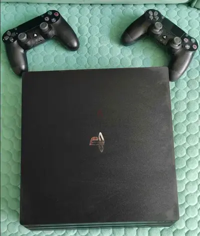 Sony PS4 Slim 1TB – 2 Original Controllers + 7 Games