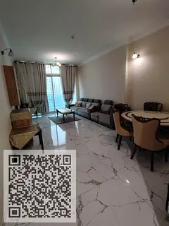 Two Bedroom Apartment with Living Room for Sale in Al Waha Towers at an Attractive Price.