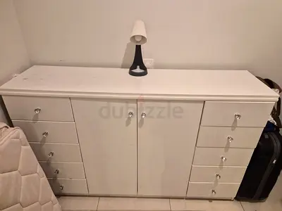 White wooden dresser / storage cabinet with 8 drawers and double doors