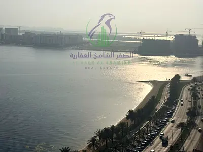 شقة غرفتين وصالة بإطلالة بحرية وبانورامية على كورنيش الخان مع غرفتين ماستر وغرفة خادمة وغرفة غسيل ومسبح وجيم وباركن مجاني