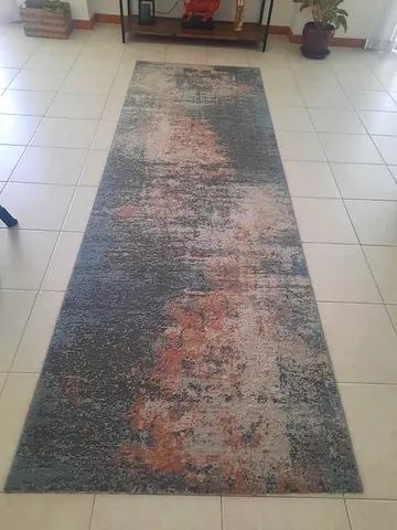 Long modern runner rug — muted blue, grey and rust tones, good condition size 3ft x 8ft