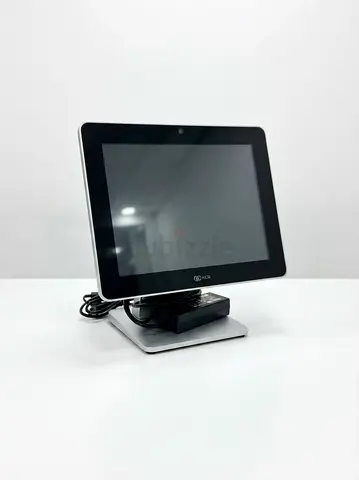 NCR Compact touchscreen POS terminal with stand and power adapter