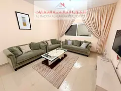 Fully Furnished Two Bedroom Apartment with Living Room for Monthly Rent in Al Taawun