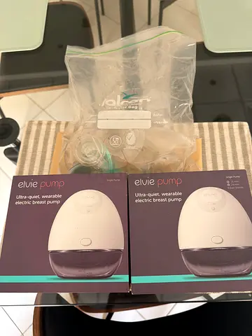Pair of Elvie Wearable Electric Breast Pumps with accessories