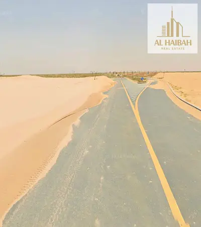 Two adjacent residential plots for sale in Rawdat Al Qurt, Sharjah