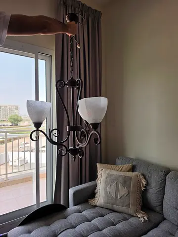 Chandelier and wall sconce