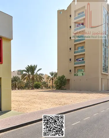 للبيع أرض سكنية تجارية في الرميلة 1 عجمان زاوية شارعين بمساحة 2,944 قدم مربع وتصريح بناء أرضي + 6 طوابق