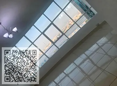 One-bedroom apartment with a living room in Orient Towers, featuring a panoramic view.