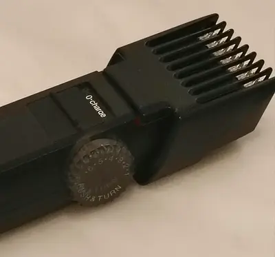 Used electric hair trimmer with adjustable guard
