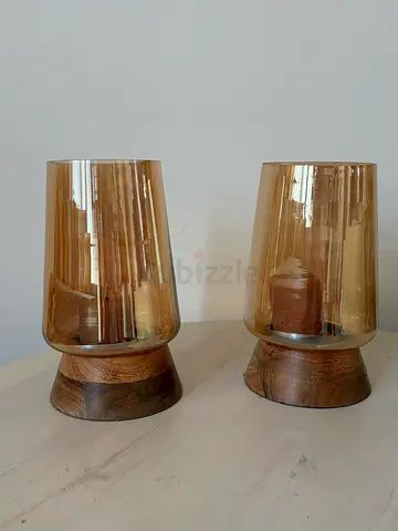 Pair of wooden base amber glass candle holders/lanterns