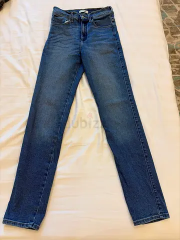Blue slim-fit women's jeans, size small - never used