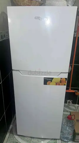 Compact white two-door refrigerator - good working condition