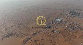 An industrial land in the Al Bataih area with a prime location, entrance from Al Dhaid Road and Khor