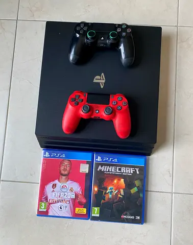 PlayStation 4 Pro 1Tb With 2 Controllers + 2 Games