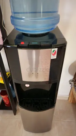 Used freestanding water dispenser/cooler  (stainless finish) HOT and COLD