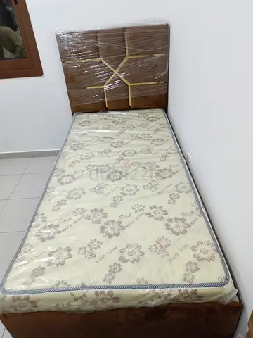 Single bed with mattress and wrapped headboard - good condition