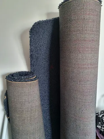 Three pieces of beautiful navy blue rugs