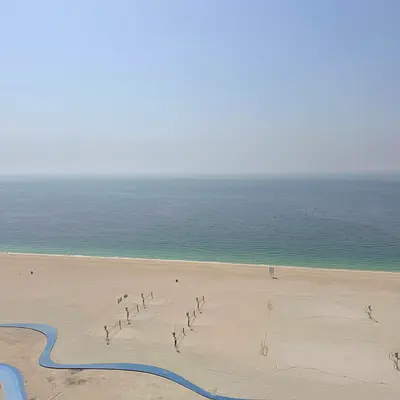 With a breathtaking sea view, the most luxurious and elegant furnished two-bedroom apartment with a living room, gym, swimming pool, and Parking