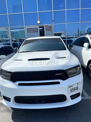 Stunning White Dodge Durango V8 – Custom SRT Looks & Dual-Tone Black/Red Interior