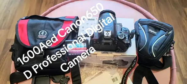 Canon EOS 650D DSLR camera paired with the EF-S 18-55mm f/3.5-5.6 IS II kit lens. Everything is in e