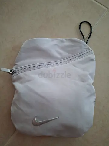 Lightly used Nike small backpack / pouch - white