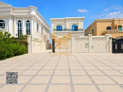 Ready-to-move-in villa with electricity, water, and air conditioning. Located on a main road in Al Mowaihat 1, ideal for residential or commercial use