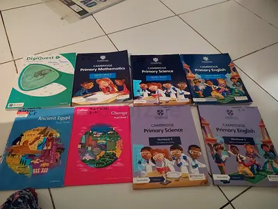 Year 5 Cambridge textbooks and workbooks collection (Primary English, Science, Mathematics) + extras