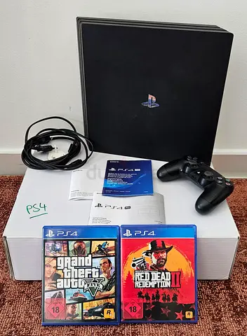 PlayStation 4 Pro with DualShock, GTA V & Red Dead Redemption II - Good Condition