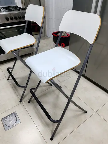 Ikea. Set of 2 white folding bar stools / chair with metal frame.