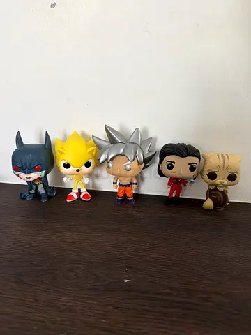 Collection of Funko Pop and Miniature Action Figures