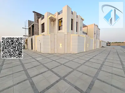 An exceptional opportunity for living and investment: a luxurious corner villa for sale in a prime location, featuring an elegant design and spacious