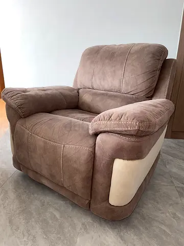Comfortable single beige swinging recliner armchair, gently used,Price is negotiable