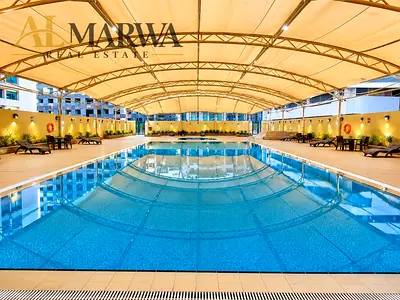Premium 2BR + Maid’s Room | A/C Free | Gym, Pool & Kids Area | Prime Location Near Sahara Mall