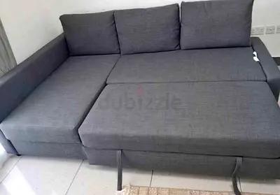 Grey L-Shaped Sofa Bed with Pull Out Section