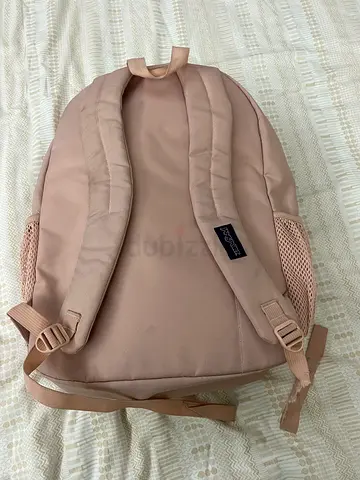 Light pink Jansport-style backpack - good condition
