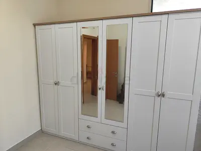 White freestanding wardrobe with shelves and drawers - Excellent condition (home center)
